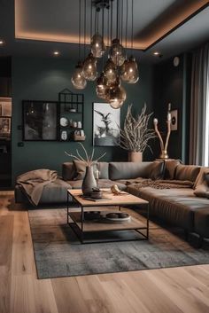 a living room filled with lots of furniture and decor on top of a hard wood floor