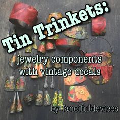 jewelry components with vintage decals are displayed on a wooden surface in front of the words tin trinkets jewelry components with vintage decals