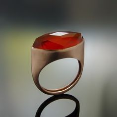 "An extraordinary ring with Marquise Red Carnelian, made of 14K brushed rose gold. You can order this ring in rose, yellow or white gold. Options are available when checking out. Please contact us for various gemstone you can have on this ring (see example last picture). All items are packaged in an eco-friendly gift box with a ribbon ready for gifting. Construction & Dimensions: 14K Gold, Red Carnelian. approximately width 11 mm (0.43\") length 21 mm (0.82\") All our jewelry can be made of 18K Floral Wedding Bands, Pink Sapphire Ring Engagement, Colour Collection, Red Stone Ring, Ring Rosegold, Red Carnelian, Carnelian Ring, Gold Statement Ring, Ring Minimalist