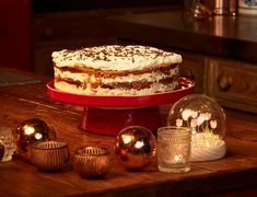 a cake sitting on top of a wooden table