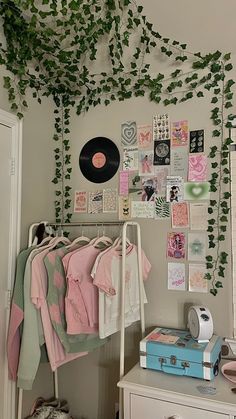 green and pink room aesthetic wall collage clothing rack vinyl record player harry styles starlight projector danish pastel aesthetic room inspo Closet Makeover Aesthetic, Aesthetic Rooms Preppy, Room Preppy Aesthetic, Danish Pastel Aesthetic Rooms, Preppy Things To Put In Your Room, Aesthetic Bedroom Danish Pastel, Danish Pastel Room Decor Ideas, Indie Preppy Room, Room Decor Inspiration Bedroom