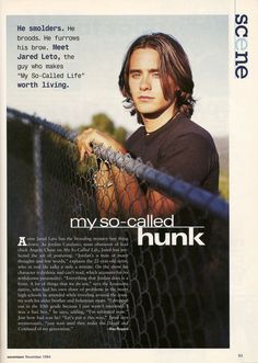 a man leaning against a fence with his hand on the chain - link fence that says, my so - called hunk