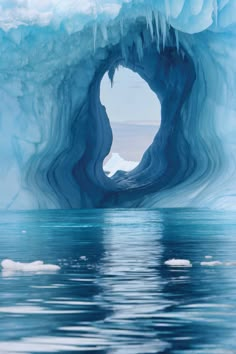 an ice cave in the middle of water