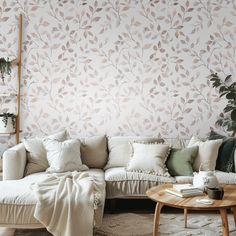 a living room filled with furniture and wallpaper