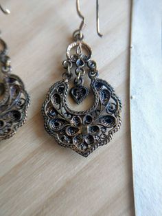 Lovely silver-gilt filigree earrings, with hooks marked 925. I am not sure that the rest of the earrings is silver, it may be gold plated brass. Good overall condition, but some traces of use. Color may vary due to lightning. Length: about 5,4 cm with the hooks. Width: about 2,5 cm at the largest point. Filigree Earrings, Glass Photo, Antique Art Deco, Purple Glass, Gold Plated Earrings, Pearl Pendant, Chandelier Earrings, Citrine, Vintage Rings