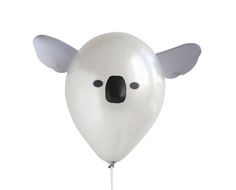 a white balloon with a koala face on it's side and ears sticking out