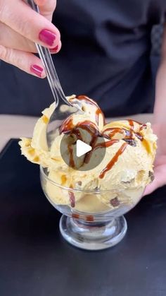 a woman eating ice cream with a spoon