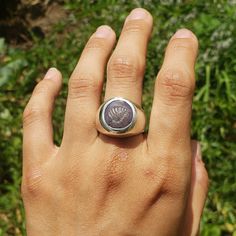 This size 8.75 sterling silver ring has a large purple sapphire set in it with a leaf intaglio carved on it. This sapphire was cut by hand in house. Queen Chess Piece, Pewter Ring, Resize Ring, Signet Rings, Purple Sapphire, Star Sapphire, Purple Band, Leaf Ring, Ring Jewelry