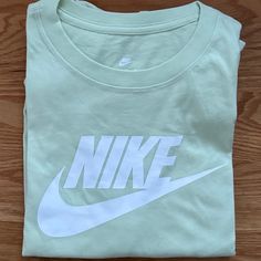 Brand New Without Tags! "The Nike Tee." Nike Women's Long Sleeve Tee. Very Pretty Light Green With White Graphic On The Front. 100% Cotton. Super Soft. Size Large. Tops Nike, Nike Tee, Pretty Lights, Nike Green, Nike Tees, Long Sleeve Tees Women, Nike Tops, Long Sleeve Tee, Light Green