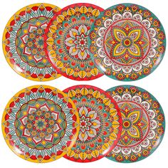 four colorful plates with designs on them