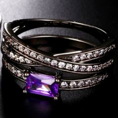 2 Rings That Can Be Worn Together Or Alone Beautiful Either Way. Black Silver Plated Bands 1 - Crossover Ring With Small Cz Stones Going Halfway Down On Each. 2- Single Band With Purple Zircon And Small Cz Halfway Down Each Side. Size 6 Luxury Purple Rings With Intricate Design, Black And Purple Rings, Purple And Black Ring, Gothic Purple Ring For Gift, Purple Multi-stone Amethyst Crystal Ring, Crossover Ring, Fancy Jewelry, Cz Stone, Purple And Black