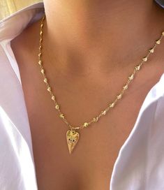 Elevate your style with our 18K Gold Plated Elongated Heart Necklace. Meticulously crafted with a touch of contemporary flair, this necklace showcases a chic elongated heart pendant. The 18K gold plating adds a lustrous sheen, ensuring that this piece remains a timeless favorite. Wear it on its own for a subtle statement, or layer it with other necklaces for a more dynamic look. A versatile addition to any jewelry collection, this necklace makes an exquisite gift for a loved one or a treat for y Layered Gold Necklace, Spring Jewelry Trends, Shoulder Jewelry, Latest Jewellery Trends, Spring Jewelry, Necklace Heart, Gold Necklace Layered, Trombone, Look Plus