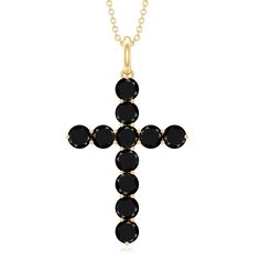 Product Details This Cross Pendant is a symbol of faith and devotion that she can wear every day with pride. The pendant features a graceful cross, skillfully crafted from Gold, that shimmers with an elegant Black Onyx gemstone in a secure Prong Setting. The timeless and classic design of this pendant ensures that it will remain a cherished accessory for years to come. This beautiful Cross Pendant is a perfect way to express ones faith and devotion, and it makes for a thoughtful and meaningful g Black Diamond Necklace, Beautiful Cross, Holy Cross, Diamond Cross Pendants, Onyx Gemstone, Signature Jewelry, Diamond Cross, Timeless Jewelry, Cross Pendant Necklace