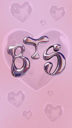 two silver letters are in the shape of a heart on a pink background with hearts