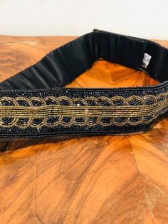 "Cumberbund belt, beaded belt, Black, Gold, Amber, Medium, Cumber Bun Velcro close Measurements: Width 2\" length 33\" Excellent condition, unused AJ904 Cumberbund belt, beaded belt, Black, Gold, Amber, Medium, Cumber Bun" Adjustable Black Embroidered Belt, Black Embroidered Adjustable Belt, Formal Black Embroidered Belt, Adjustable Party Sashes, Adjustable Gold Fabric Belt, Adjustable Black Evening Belt, Black Bohemian Embroidered Belt, Bohemian Black Embroidered Belt, Adjustable Embroidered Gold Belt