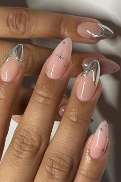 Add a touch of elegance and edge to your style with these sophisticated sheer pink stiletto nails featuring silver chrome French tips and delicate star designs. The perfect blend of chic and glam to make a fashion-forward statement. ✨ // Photo Credit: Instagram @ceesclaws Silver Nail, Star Nails, Silver Nails, Prom Nails, Pretty Acrylic Nails, Chic Nails