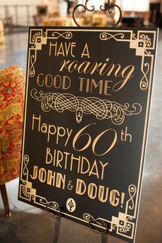 a sign that says have a roaring good time happy birthday john doug