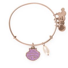 This Disney® charm bangle wants to be part of your world! Featuring an organic glass pearl and a purple clam shell charm printed with “The Little Mermaid Curious & Kind” on the front, this expandable charm bracelet is the perfect addition to your magical stack. Keep the magic close. Disney Style Pink Jewelry Gift, Pink Disney Jewelry For Gift, Pink Disney Jewelry For Gifts, Adjustable Charms Bangle, Disney Silver Jewelry With Charms, Disney Charm Bracelet, Alice In Wonderland Charm Bracelet, Jewelry Style Guide, Unicorn Charm Bracelet