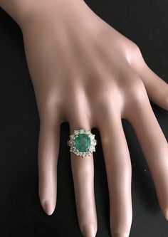 Gia Certified Luxury Pear-shaped Jewelry, Luxury Pear-shaped Diamond Ring With 17 Jewels, Luxury Pear-shaped Emerald Ring With Prong Setting, Luxury Pear-shaped Emerald Ring For Formal Occasions, Formal Gia Certified Cluster Ring, Gia Certified Cluster Diamond Ring For Formal Occasions, Luxury Gia Certified Cluster Rings, Gia Certified Luxury Cluster Rings, Formal Cluster Brilliant Cut Emerald Ring