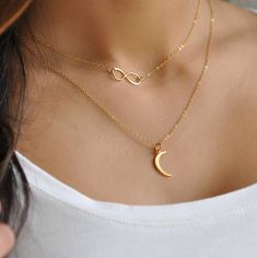 "Our simple dainty moon necklace is a super chic piece. It is gorgeous alone or fun to layer with other favorites. The crescent moon hangs from our signature dainty sparkly chain and is available in gold or silver. It will be your everyday go to piece.  Our gift to you 10% off your first purchase. Details here - http:/eepurl.com/dpVPBz DETAILS Our moon charm is approximately 3/4\" high. This listing is for the crescent moon necklace only All Norah Stella Jewelry comes wrapped and ready for gift giving. View our eternity link necklace here: https://www.etsy.com/listing/527284666/simple-gold-choker-necklace-dainty?ref=shop_home_active_4 View our other awesome moon necklace here: https://www.etsy.com/listing/269591983/crescent-moon-necklace-sterling-silver?ref=shop_home_active_42 Follow me he Dainty Moon-shaped Jewelry For Everyday, Minimalist Everyday Necklace With Moon Charm, Minimalist Layered Necklace With Round Pendant, Minimalist Adjustable Moon Phase Necklace, Delicate Sterling Silver Layered Necklace Gift, Minimalist Everyday Moon Charm Necklace, Elegant Layered Necklace With Moon Charm As Gift, Trendy Crescent Jewelry Gift, Dainty Moon Charm Necklace For Everyday