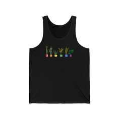 Description Our LGBTQ Pride Tank Top blends style with activism. Showcasing a variety of potted plants in rainbow colors, this Queer Tank Top is perfect for anyone looking to express their Queer Pride. It's more than a tank top; it's a symbol of unity and diversity. Shirt Details • Gender Neutral• 100% Cotton• Light fabric• Retail fit• Tear away label• Runs true to size Casual Summer Tops With Plant Details, Casual Rainbow Sleeveless Top, Pride Cotton Tops With Graphic Print, Casual Sleeveless Tops For Pride, Pride Graphic Print Cotton Tops, Cotton Top With Text Print For Pride, Diversity Shirt, Unity And Diversity, Lgbtq Clothing