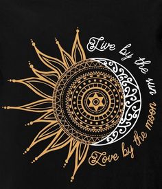 a black t - shirt with gold and white designs on the front, says love by the sun