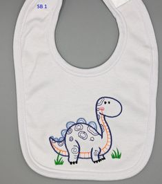 These precious Gerber dribble bibs are embroidered with darling baby animals.  They are 100% soft cotton for  babies from age 0 to 6 mo.  What a wonderful shower/new born baby gift.  These quality made bibs fasten with Velcro so no tying or snaps that leave rust stains.  They will soon become baby keepsakes, or can be passed on to the next baby in the family.  Machine wash and tumble dry, the embroidery will not fade and the bib will remain a cute fashion statement.   These bibs can be personali Baby Bib Ideas, Painted Onesies, Bib Ideas, Baby Keepsakes, Baby Bibs Patterns, Baby Boy Bibs, Bib Pattern, Boy Drawing, Dribble Bibs