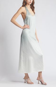 Move easily in this flowy maxi dress made of soft satin with a subtle sheen and designed with a racerback that won't get in your way. Slips on over head Scoop neck Racerback 100% polyester Machine wash, tumble dry Imported Spring Backless Satin Finish Maxi Dress, Backless Maxi Dress With Satin Finish For Spring, Spring Satin Finish Backless Maxi Dress, Backless Satin Finish Maxi Dress For Spring, Spring Halter Neck Maxi Dress With Bias Cut, Summer Satin Maxi Dress With Spaghetti Straps, Summer Slip Dress With Satin Finish, Maxi Length, Summer Slip Dress With Satin Finish In Maxi Length, Summer Satin Halter Neck Dress With Bias Cut