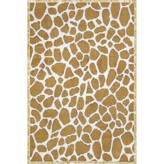 a brown and white rug with giraffe print