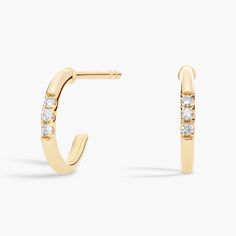 Go for classic style with these sophisticated semi-hoop earrings crafted from gleaming 14k yellow gold. A trio of diamonds along the front edge gives them subtle sparkle in the light. Mini Hoop Earrings, Earring Crafts, Blue Nile, The Light, Types Of Metal, Classic Style, Hoop Earrings, Diamonds, Sparkle