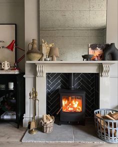 Stove fireplace Tiled Fireplace Herringbone, Herringbone Fireplace Insert, Tile Wood Stove Surround, Tiled Log Burner Fireplace, Fireplace Tile Surround Ideas, Herringbone Fireplace Tile, Herringbone Tile Fireplace, Small Log Burner, Stove Surround