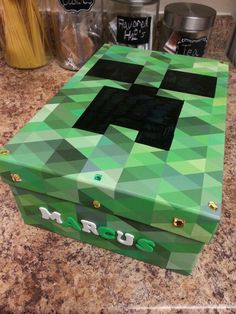 a green box sitting on top of a counter