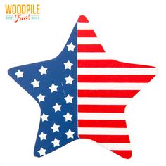 a red, white and blue star shaped ornament with the word woodpile on it