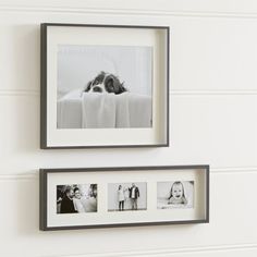 two framed pictures hanging on the wall next to each other, one with a child's face in it