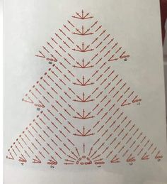 a white paper with red dots on it and a triangle in the middle that has been cut out