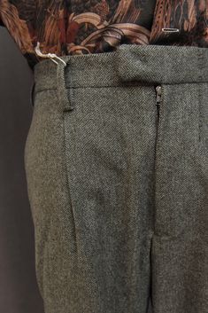 Made in 100% wool herringbone from Austria. Very comfortable. Greenish tone which is wearable and more unique than the typical grey toned herringbone trousers. Brand: An Irrational Element Size S (30 or 31): Waist 31" Inseam 29 1/2", bottom opening: 17". Size M (32): Waist 34", Inseam 30 1/2", bottom opening: 17 1/2". Size L (35): Waist 37", Inseam 30 1/2", bottom opening: 17 1/2". Herringbone Trousers, Abstract Resin Art, Black Pins, Pewter Grey, Pleated Trousers, Sheffield, Resin Art, Herringbone, Austria