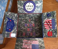 an open box with the words i miss my hero written on it and american flags