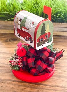 a red mailbox with a christmas tree on it and the words dollar tree diy christmas mailbox decor