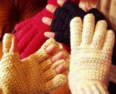 three women's hands wearing knitted mittens and gloves