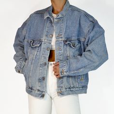 This vintage denim was produced over 20 years ago, giving it quality and character that can't be rivaled. No two pairs of jeans at DETOUR VINTAGE are the same--owning a pair is owning a piece of history. This pre-loved garment may show signs of age, but all of our denim is clean and ready to wear. MEASUREMENTS | FLAT, NOT DOUBLED Chest: 23.75" | Length: 24" | Sleeve: 22.5" LEVI'S TRUCKER JACKET | 100% COTTON | 1990s 2 BREAST POCKETS | 2 WAIST POCKETS | RED TAB MADE IN USA | TAG SIZE MEDIUM Beaut Vintage Levis Denim Jacket, Levis Denim Jacket, Style Inspiration Summer, Levis Denim, Denim Jackets, Trucker Jacket, Summer Outfits Women, Vintage Levis, Vintage Denim