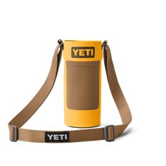 the yeti water bottle is attached to a strap