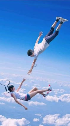 two people are in the air with their feet up