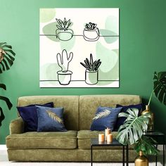 a living room with green walls and potted plants on the wall, in front of a couch