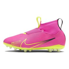 the nike vapor soccer shoe is bright pink and has neon yellow accents on the upper part