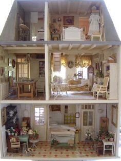 a doll house with all the furniture in it