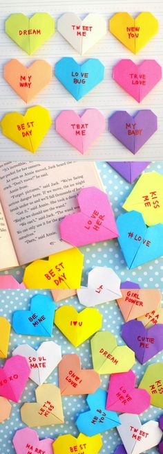 several different colored paper hearts with words on them