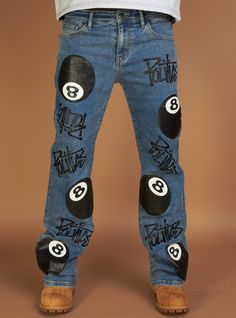 These baggy wide-leg heavy denim jeans feature a bold 8-ball screen print, blending streetwear edge with retro vibes. The relaxed fit and sturdy fabric ensure both comfort and durability, making them a standout piece for any casual wardrobe. Perfect for those who love to make a statement with their style. Street Wear Jeans Men, Cricut Jeans, Jeans Design Ideas Men, Paint Pants Ideas, Stud Fashion Outfits, Custom Pants Ideas, Airbrush Jeans, Painted Jeans Diy, Streetwear Fashion Design