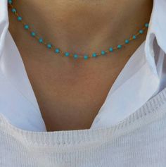 Turquoise Rosary Necklace made of high-quality 925 Sterling Silver coated with 14k gold layers. Classy necklace made of turquoise beads. Appropriate for both everyday or exceptional occasions. Also available in Sterling Silver option. Find similar necklaces here: https://www.etsy.com/listing/606617035/pearl-rosary-necklace-dainty-pearl?click_key=3304f481a68eb9e691254de0272e872262a15ad6%3A606617035&click_sum=631697d2&ga_search_query=rosary&ref=shop_items_search_16&pro=1&frs=1 https://www.etsy.com Dainty Blue Turquoise Necklace As A Gift, Gold Turquoise Necklace With Colorful Beads As Gift, Elegant Blue Turquoise Necklace With Colorful Beads, Turquoise Beaded Choker, Turquoise Beaded Chain Choker, Blue Dainty Necklace With Colorful Beads, Dainty Blue Necklace With Colorful Beads, Elegant Turquoise Jewelry With Tiny Beads, Dainty Blue Jewelry With Natural Stones