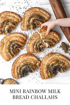 mini rainbow milk bread chalais on a cutting board with cinnamon sprinkles