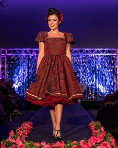 This rich in burgundy color is designed as a one-of-a-kind dress by PMdesigns by Pamela Marie. It has a gorgeous embroidery pattern throughout, and a gold trim around the hem of a full skirt with hidden pockets, and matching trim on the front bodice. The back is cut in a V, and has a zipper up the back. Suggested measurements: 34" Bust x 26" Waist x Hips Free Fitted Burgundy Dress For Festive Occasions, Fitted Brocade Dresses With Gold Embroidery, Viva Las Vegas Rockabilly, Burgundy Evening Dress, Rich Burgundy, Full Skirts, Burgundy Color, Embroidery Pattern, Full Skirt